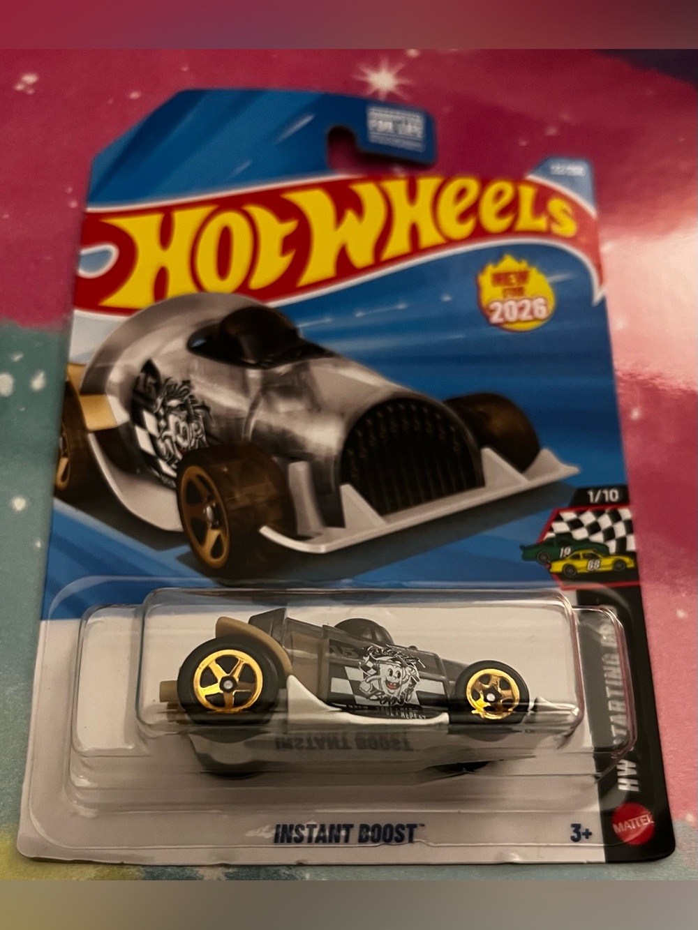 New For 2026: Hot Wheels Instant Boost Toy Car - Silver & Black with Gold Wheels